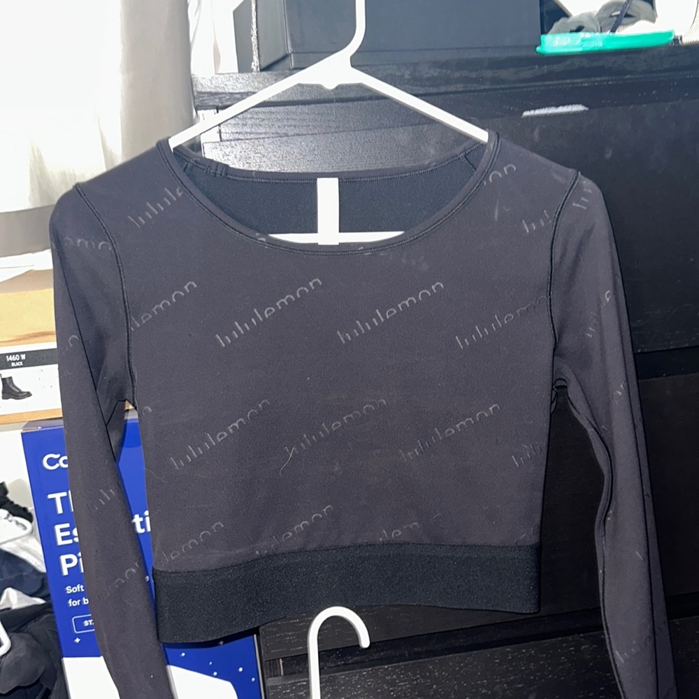 Never worn Lulu Lemon long sleeve shirt